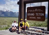 We pose by the Grand Teton N. P. sign